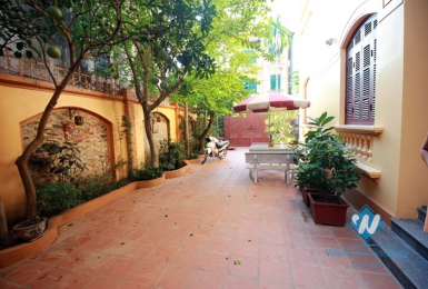 A charming house with large courtyard around for rent in Tay Ho area, Hanoi.